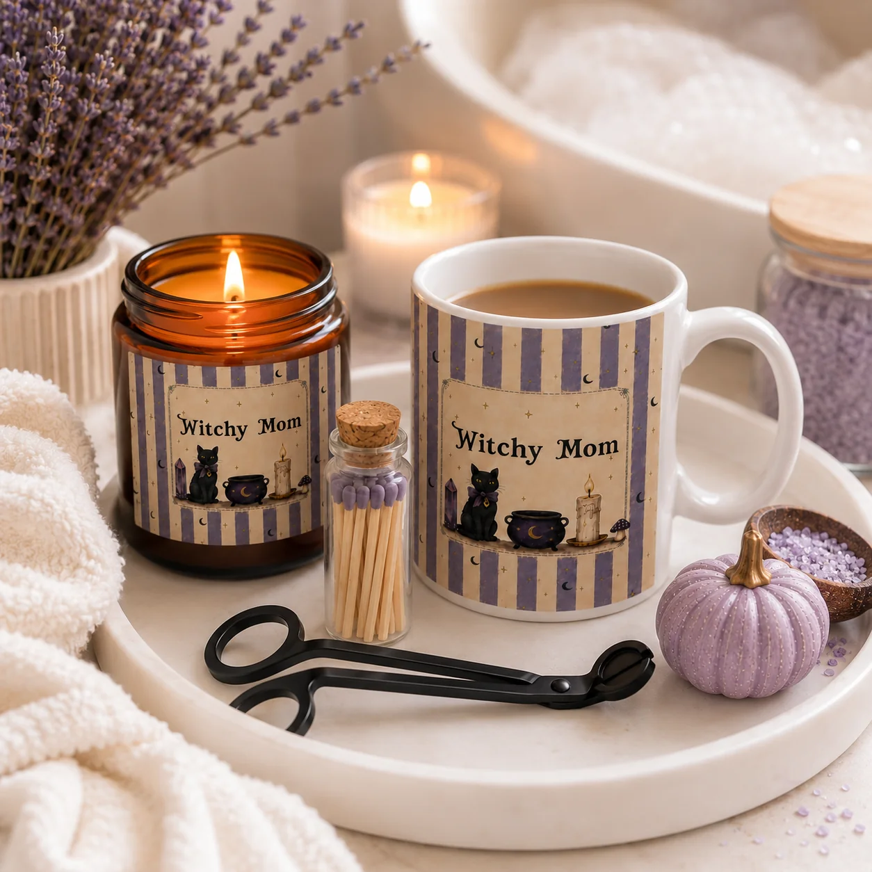 Witchy Gifts for Her: a personalized Witchy Mom black cat mug and matching amber soy candle on a cream tray with lavender and a lilac pumpkin.